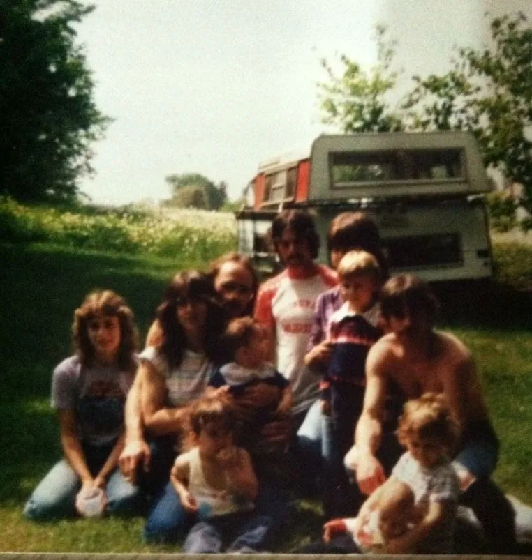 Vintage photo of a large midwestern family in a field