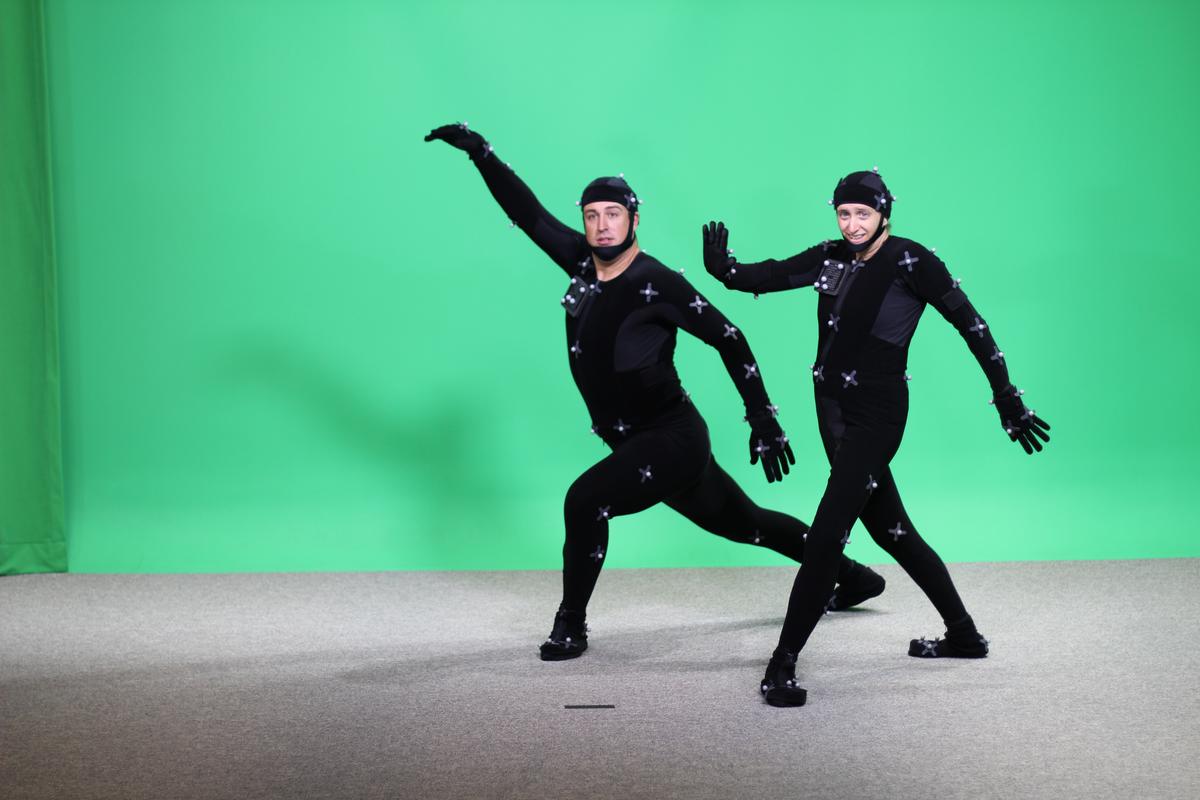 dancers in motion capture suits