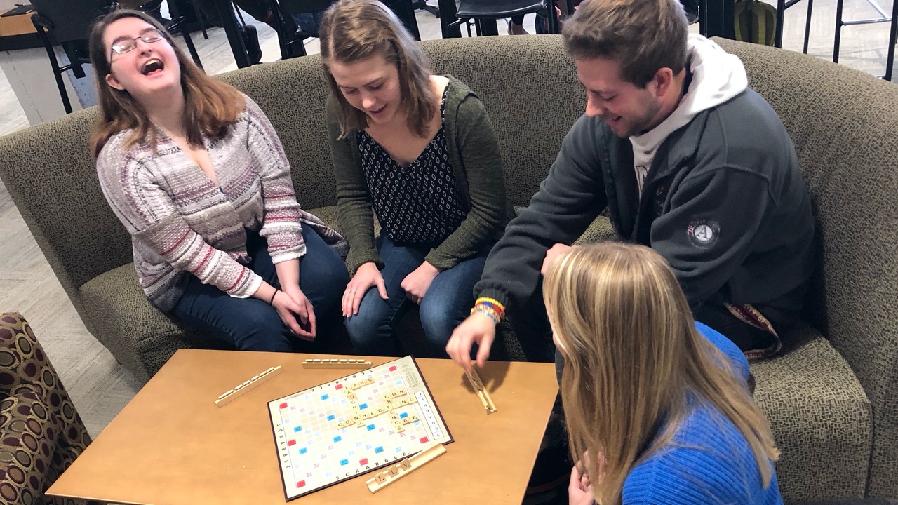 Students playing Scrabble